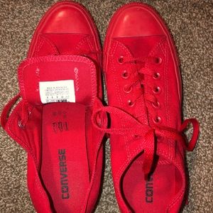 All red Converse shoes. Women’s 8/Men’s 6